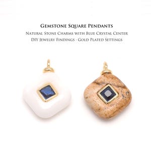 May include: Two gemstone square pendants with gold-plated settings. One is white with a blue crystal center, the other is tan with a blue crystal center. The image includes text: "GEMSTONE SQUARE PENDANTS".