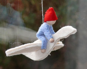 Nils Holgersson op de gans.