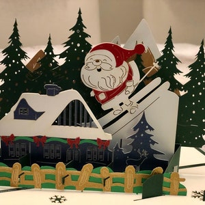 Kerstman skiën pop-up kerstkaart
