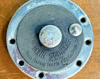 Carrete convencional Penn 140 Squidder con placa lateral izquierda, fabricado en EE. UU.