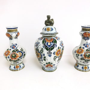 Set of 3 Dutch Delft Polychrome Cabinet set, 2 knobble vases and 1 Ginger jar / urn, hand painted