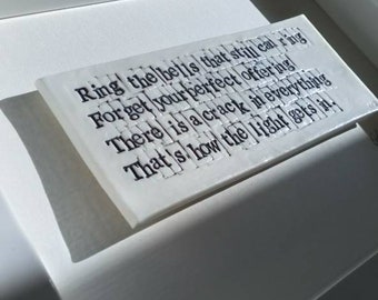 there is a crack in everything, that is how the light gets in.&quot; Words in Porcelain - Art tile
