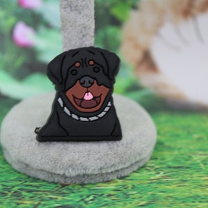 Rottweiler dog with chain shoe charm