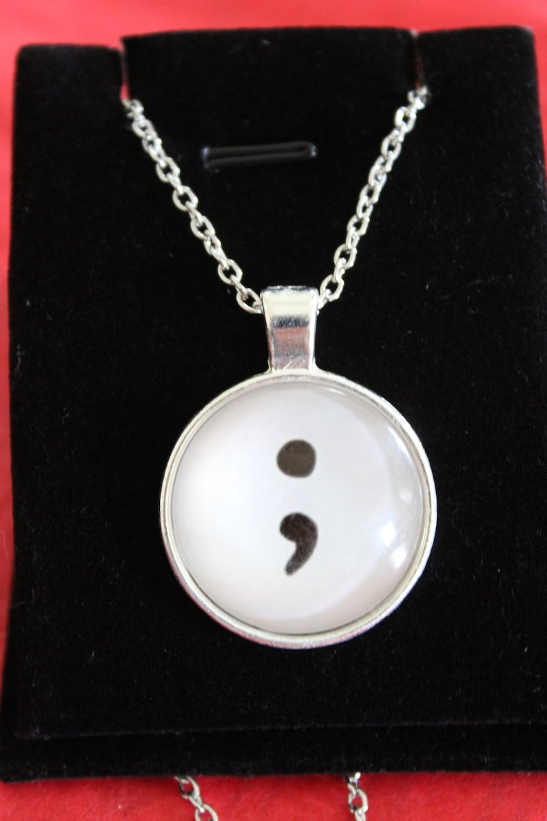 Semi colon pendant necklace