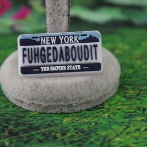 Fuhgedaboudit plate shoe charm ( Original design)