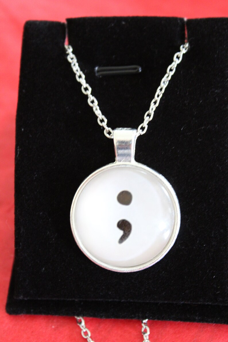 Semi colon pendant necklace