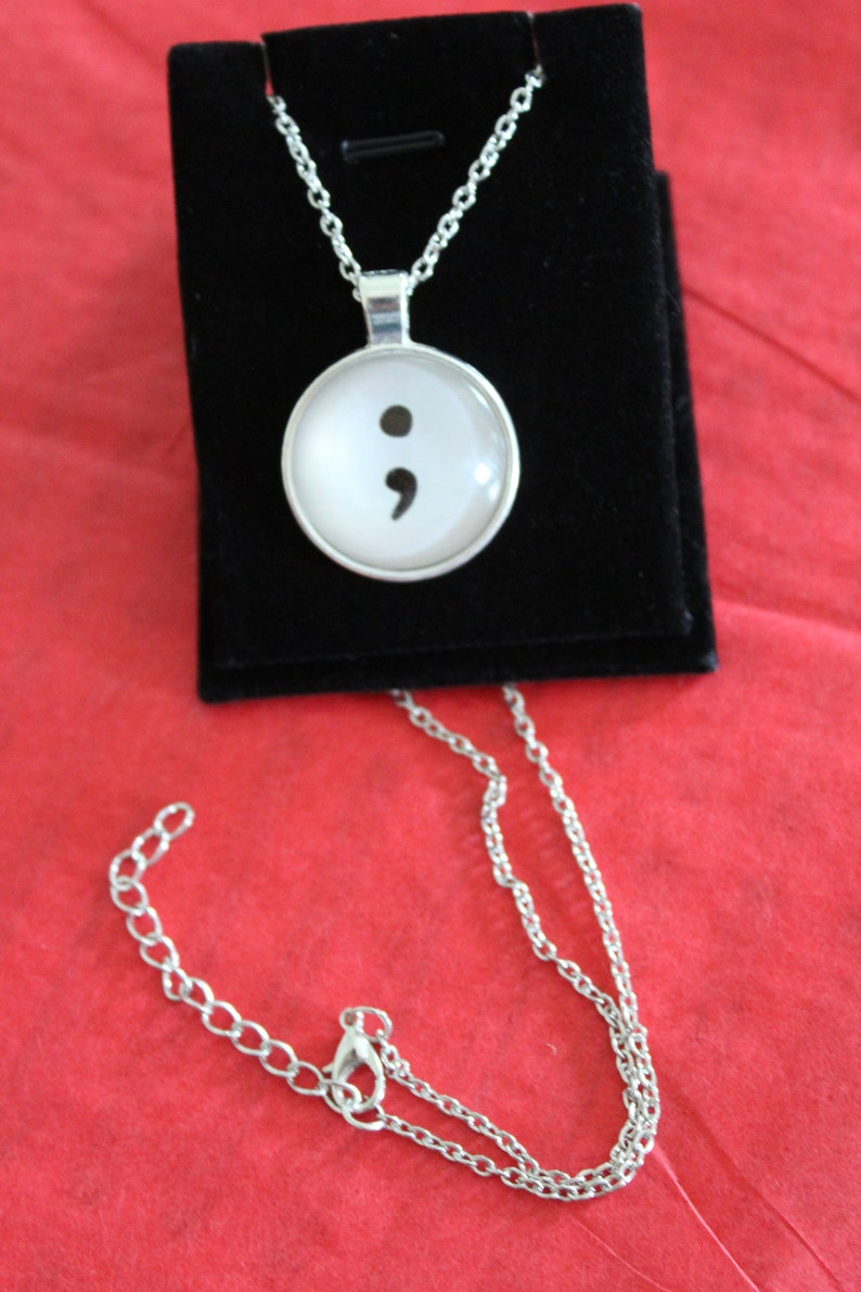 Semi colon pendant necklace