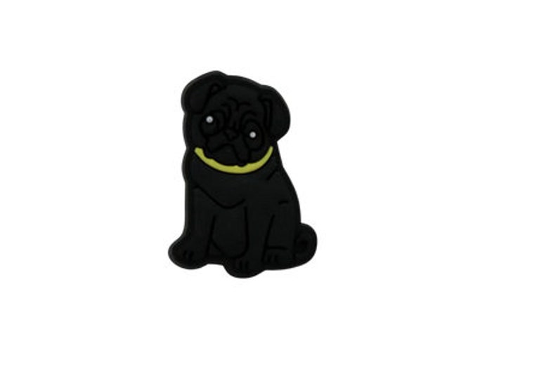 May include: Black rubber pug dog charm with a yellow collar.