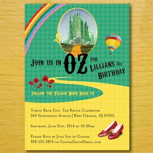 May include: A green and yellow invitation with a rainbow and a hot air balloon. The invitation says "Join us in Oz for Lillians 3rd Birthday" and "Follow the Yellow Brick Road to Turtle Back Zoo: The Reptile Classroom 560 Northfield Avenue West Orange, NJ 07052 Saturday, June 21st, 2014 at 10:30am Please RSVP by June 5th to Glenda 908.555.3876 or GlendaSmith@mail.com"