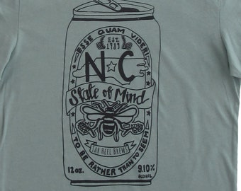 NC State of Mind: Female Faded Teal Hand Printed 100% Organic Cotton Original Mushpa + Mensa Designer T-Shirt
