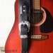 see more listings in the Sangles de guitare noires section