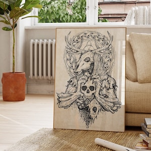 May include: A black and white illustration of a creature with antlers, holding a skull. The illustration is framed and hanging on a wall in a living room.