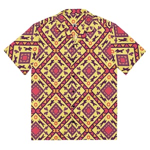 May include: Short-sleeved button-down shirt with a vibrant geometric pattern. The shirt features a yellow background with repeating diamond shapes in red, purple, and orange. The design includes stylized figures and shapes, creating a bold and eye-catching look.