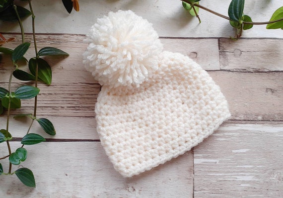 Tiny baby hotsell pom pom hat