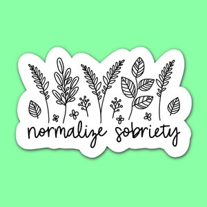 Puede incluir: Pegatina en blanco y negro con un diseño floral y el texto "normalizar la sobriedad".