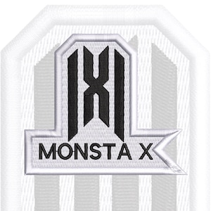 May include: A white embroidered patch featuring a black Monsta X logo centered on a white background with vertical light gray stripes. The design includes a stylized black emblem above the text MONSTA X, all enclosed in a white border.