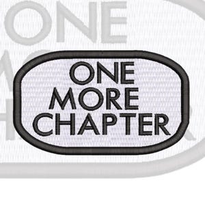 May include: An oval-shaped embroidered patch with a white background and a thick black border. The text "ONE MORE CHAPTER" is stitched in bold, black, sans-serif capital letters across the center of the patch, filling the entire space.