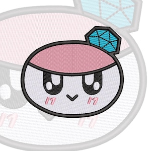 May include: An embroidered patch featuring a circular character with a light pink top, a white face, and large black eyes. A small blue diamond-shaped icon with a black grid pattern sits on the upper right side. The character has a black V-shaped mouth and two small pink vertical lines on each cheek.