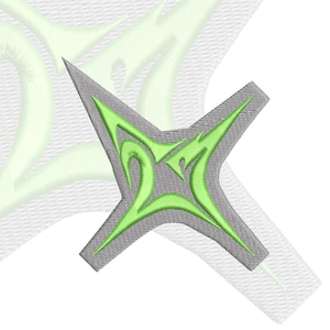 May include: A four-pointed star-shaped embroidery patch featuring a grey base with a bright lime green tribal-style design stitched on top. The embroidery has a visible textured thread pattern throughout the entire shape of the star.