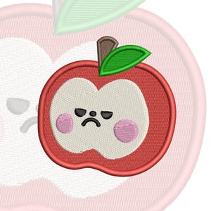 May include: An embroidered patch featuring a red apple with a cream-colored center. The apple has a grumpy facial expression with black eyes and a curved mouth, plus two pink circular cheeks. A brown stem and a single green leaf are on top.