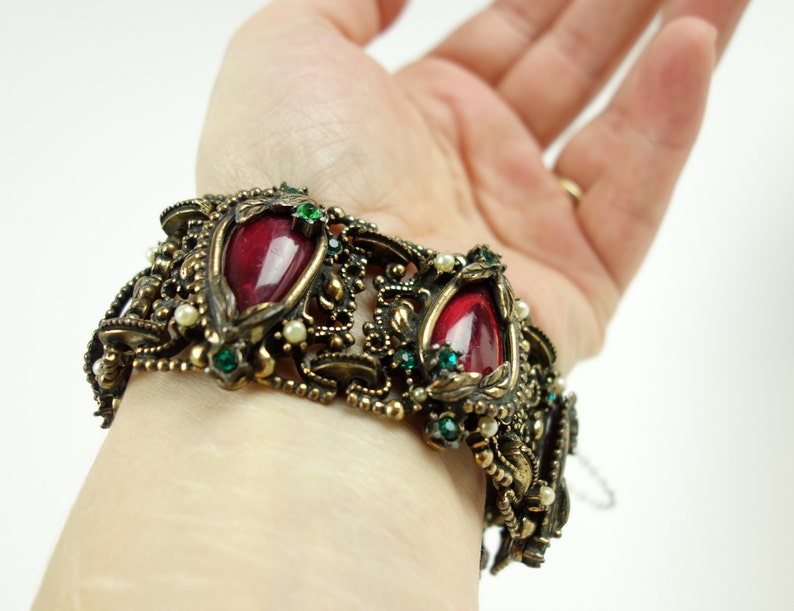 Gold tone bracelet white pearl and red tear drop center lucite wide cocktail bracelet green rhinestone