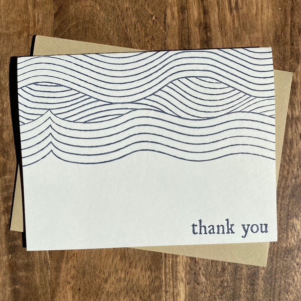 Letterpress folded thank you cards with waves