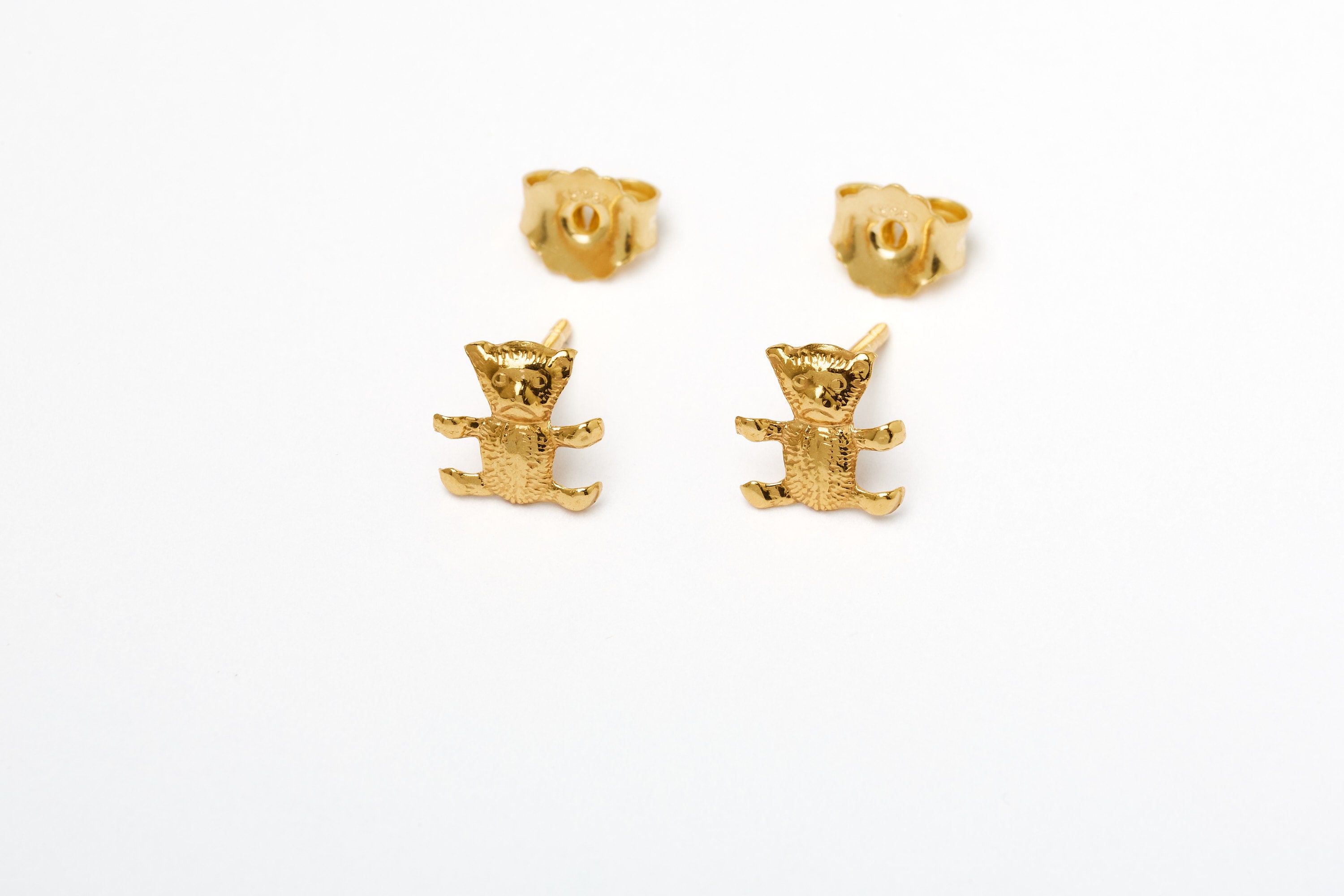 A Pair of Golden Teddy Bear Stud Earrings - Etsy