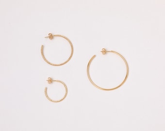 A pair of 2cm Golden facetted Hoops waterproof gold plated Sterling Silver