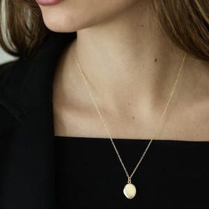 Golden Necklace with a oval Medaillon Photo Locket  Tiny Locket Necklace Golden Necklace