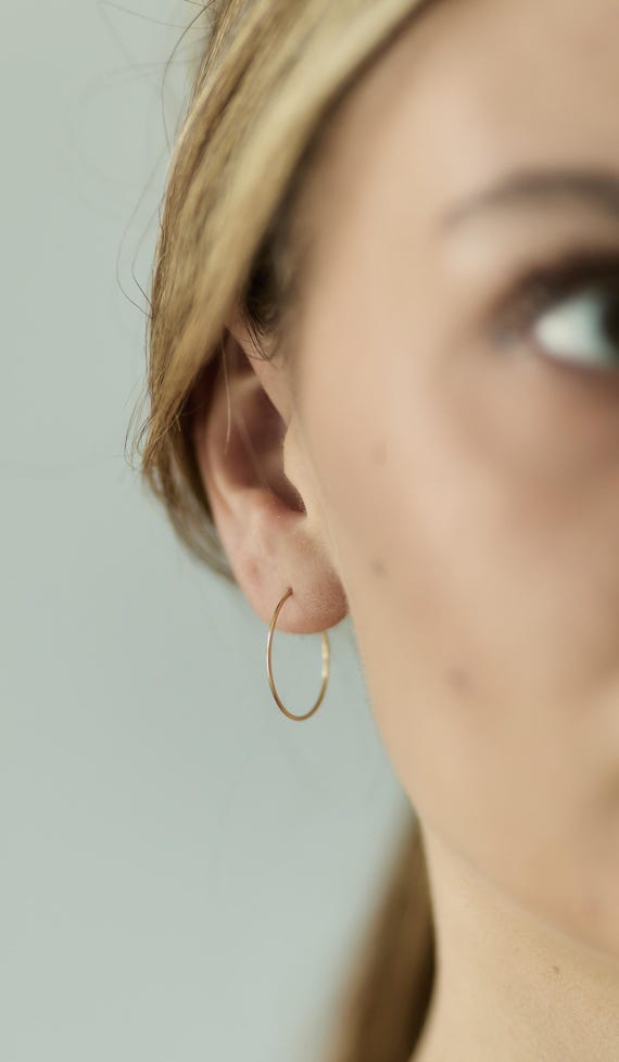 Orecchini a forma di cerchio lavorato 14 mm in argento 925