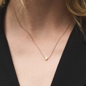 Golden  Short Necklace with a tiny rhombus shaped  pendant Diamond Rhombus Necklace Bead