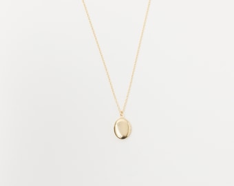 Golden Necklace with an oval Photo Locket Tiny Medaillon Pendant