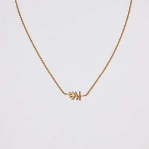 Golden Necklace with a small twig  Leaf  Fine golden necklace