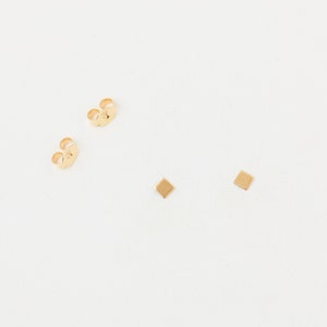 A Pair of Tiny golden Dots Minimal Studs square Earstuds Minmalistic  Earrings Honeycombed Studs Architect