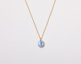 Golden Necklace with a vintage pendant Windmill
