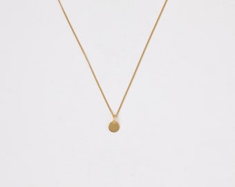 Golden Necklace with a tiny disc