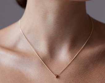 Golden Short Necklace with a tiny rhombus shaped  pendant