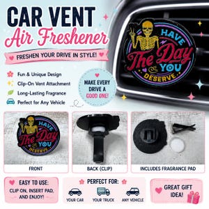May include: A round car vent air freshener featuring a yellow skeleton graphic with the text HAVE THE DAY YOU DESERVE. The black circular accessory includes a rear clip attachment and a white circular fragrance pad for insertion into the back.