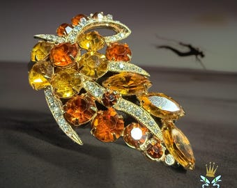 Broche Eisenberg de los años 70 con citrino, topacio y diamantes de imitación.