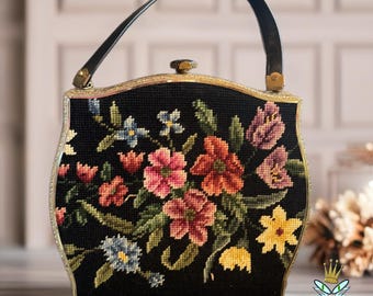 Bolso de mano bordado con flores negras de los años 60