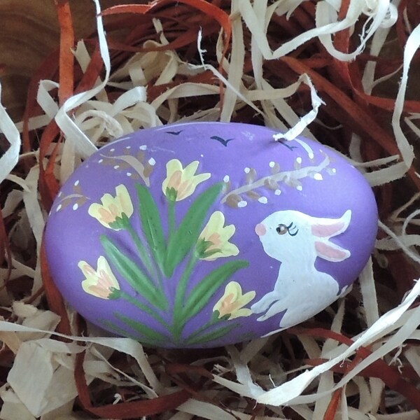 A vintage ceramic Easter egg with custom paint purple with yellow flowers and a white bunny rabbit handpainted made in the USA