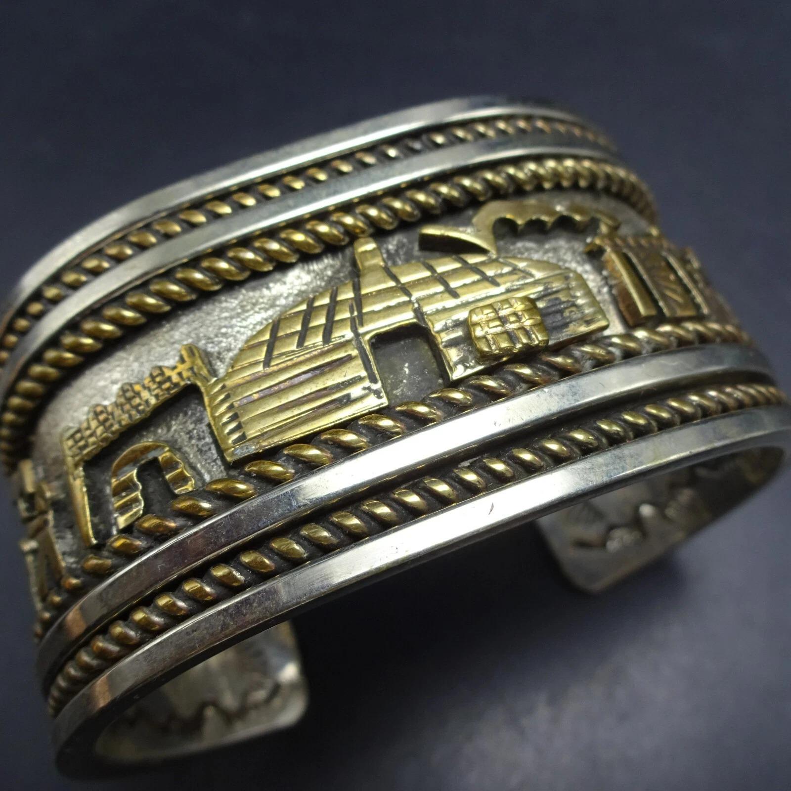 ヴィンテージ　ナバホ族　シルバーバングル　ストーリーテラー　トーマスシンガー Navajo storyteller bracelet - Etsy 日本