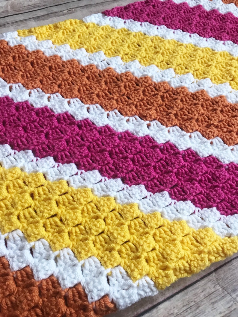 pink and orange throw blanket