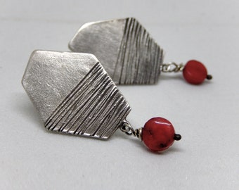 Big silver polygon earrings with dangle coral bead. Modern textured sterling silver geometric earrings. Faceted silver studs.