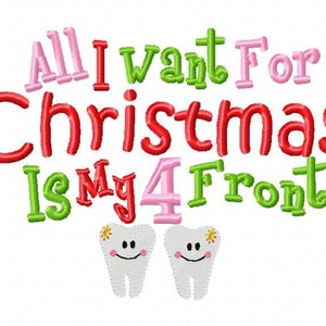 May include: Embroidered design with the text "All I want for Christmas is my 4 front" in pink, green, and red. Two white teeth with yellow stars and smiling faces are below the text.
