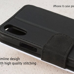 May include: Black leather iPhone X case with a flap closure and stitching detail. The case has a slimline design.