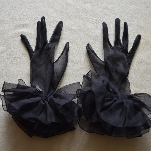 Black sheer nylon gloves with double frill at wrist.  One size