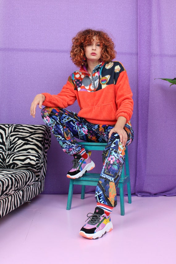 orange half zip pullover