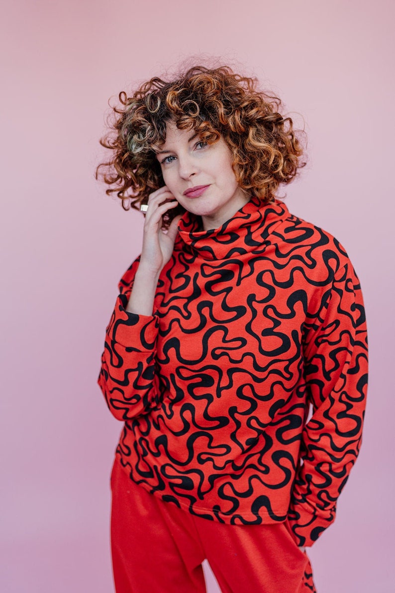 Funnel Neck Pullover in Orange Squiggle Print image 1