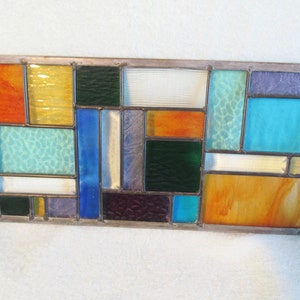 leaded stained glass panel with Four Season theme